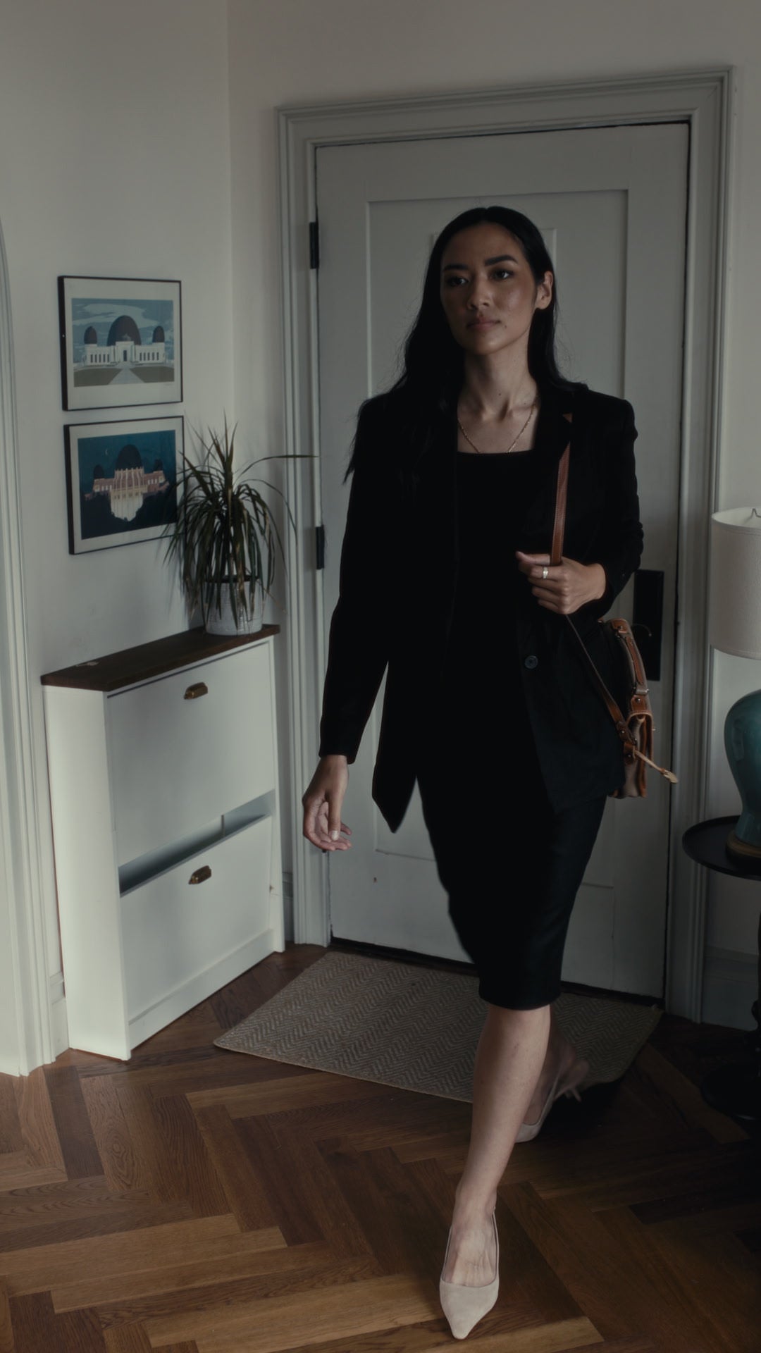 Alana in Court Jacket and 90's Midi in Black walking back into door from work